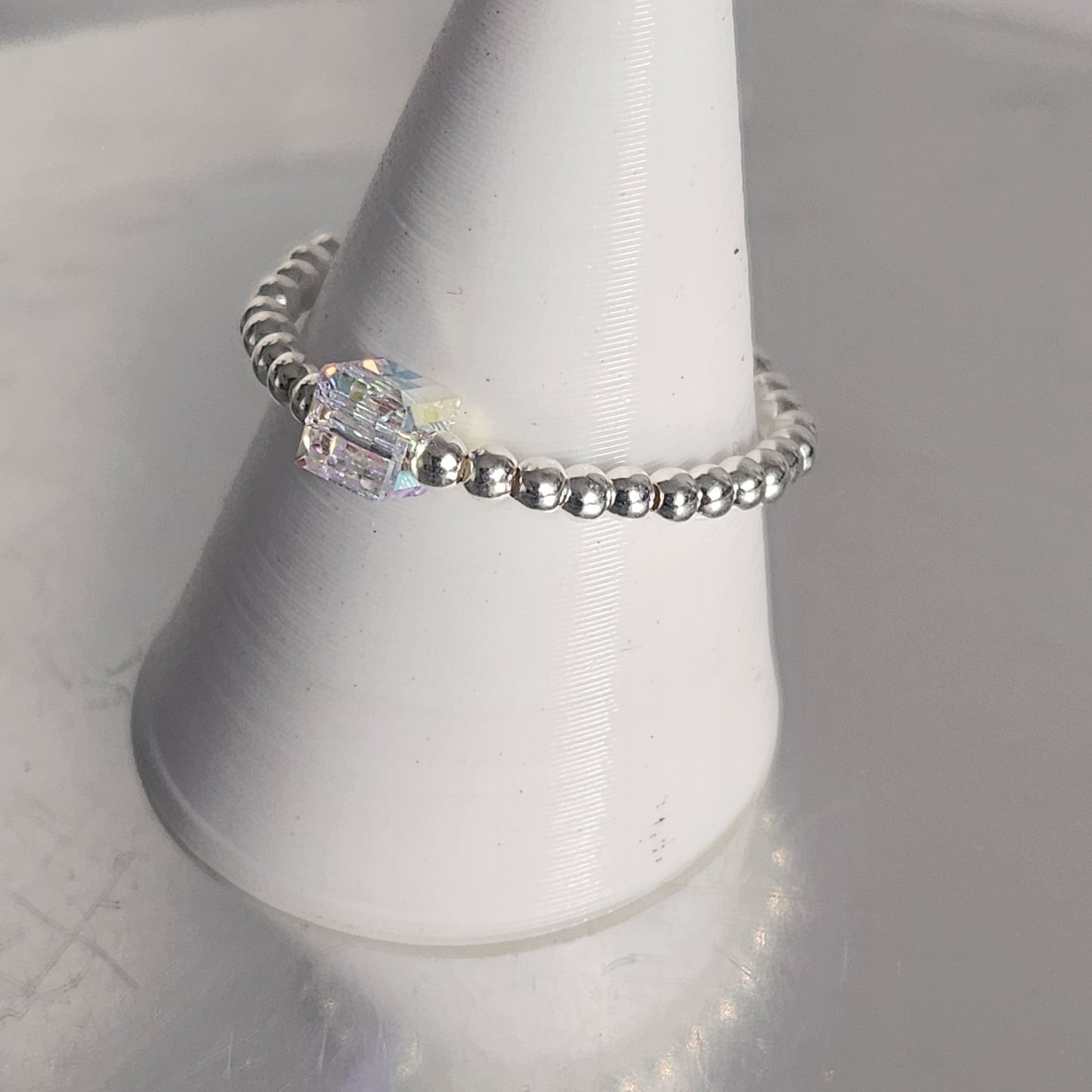 Anillo Elastizado Crystal Swarovski Cubo 4mm Aurora Boreal en Plata 925