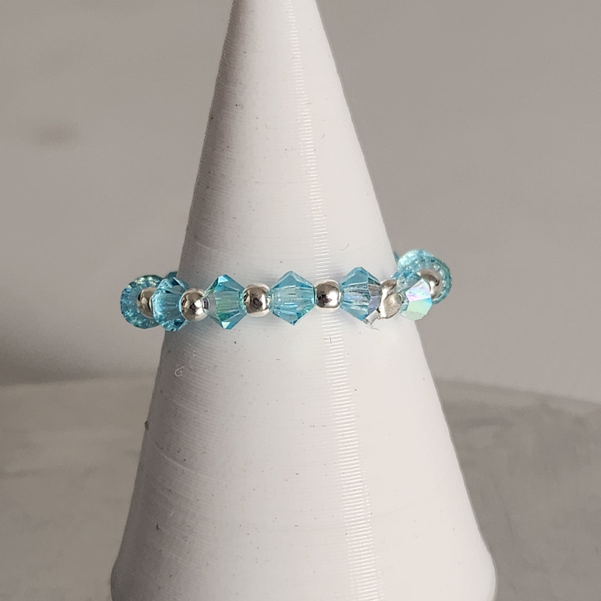 Anillo Sin Fin Biconos Piedras Swarovski 3mm y Plata 925