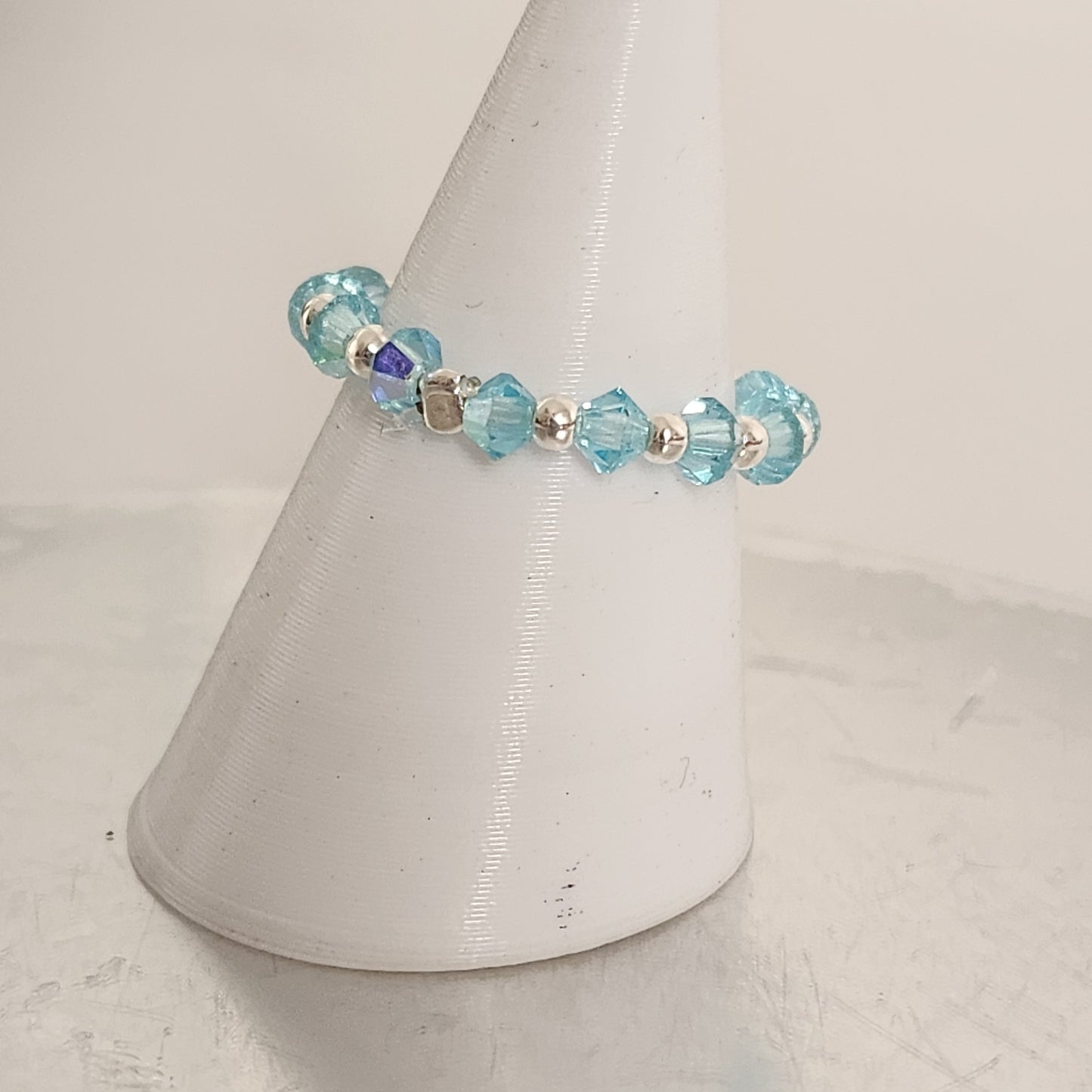 Anillo Sin Fin Biconos Piedras Swarovski 3mm y Plata 925