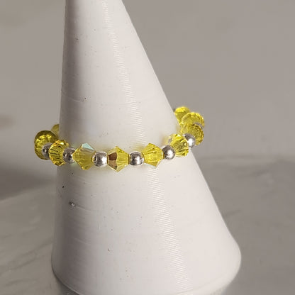 Anillo Sin Fin Biconos Piedras Swarovski 3mm y Plata 925