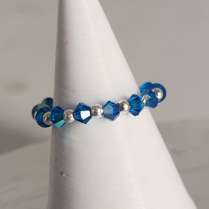 Anillo Sin Fin Biconos Piedras Swarovski 3mm y Plata 925