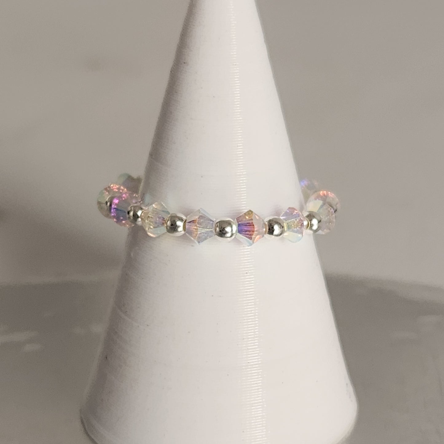 Anillo Sin Fin Biconos Piedras Swarovski 3mm y Plata 925
