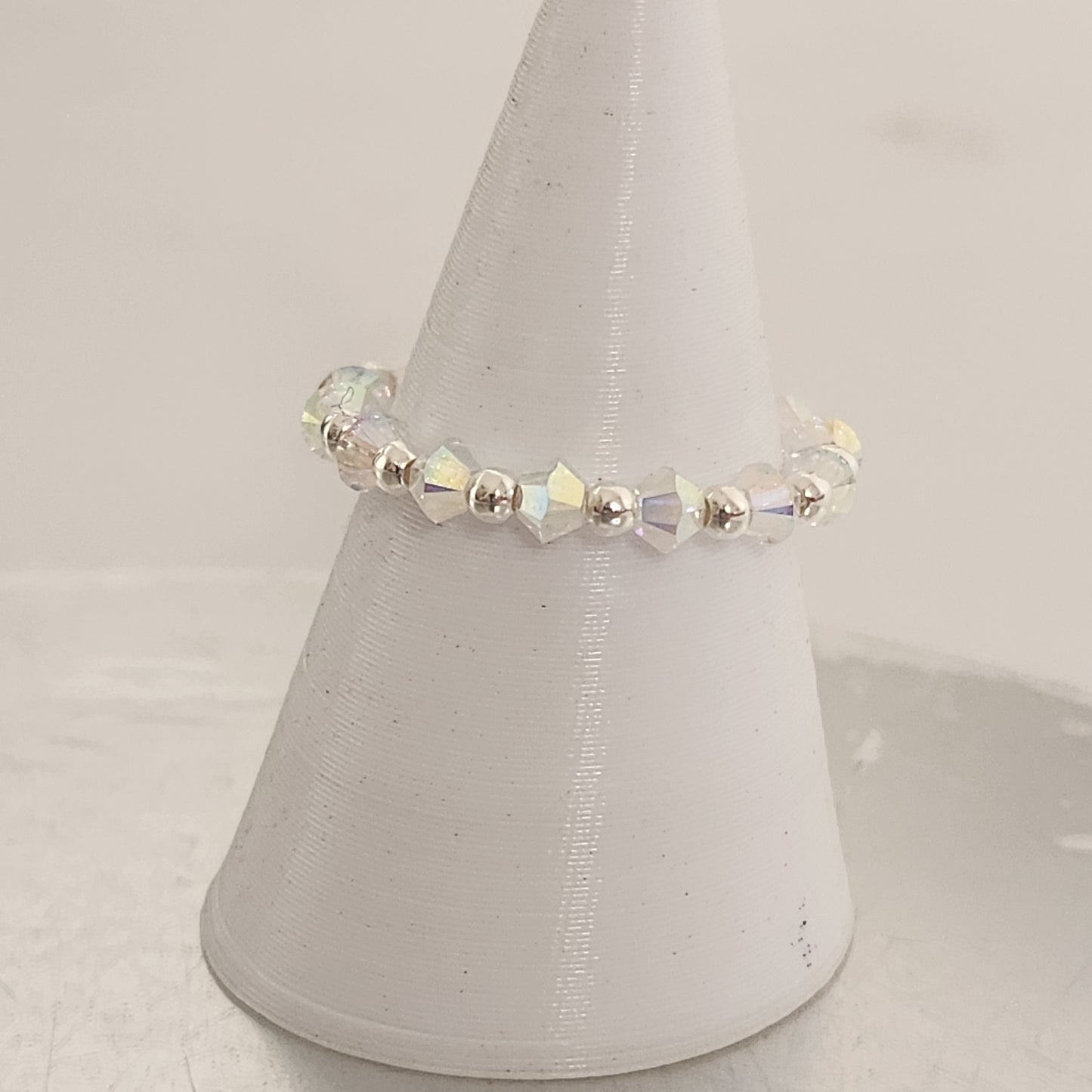 Anillo Sin Fin Biconos Piedras Swarovski 3mm y Plata 925
