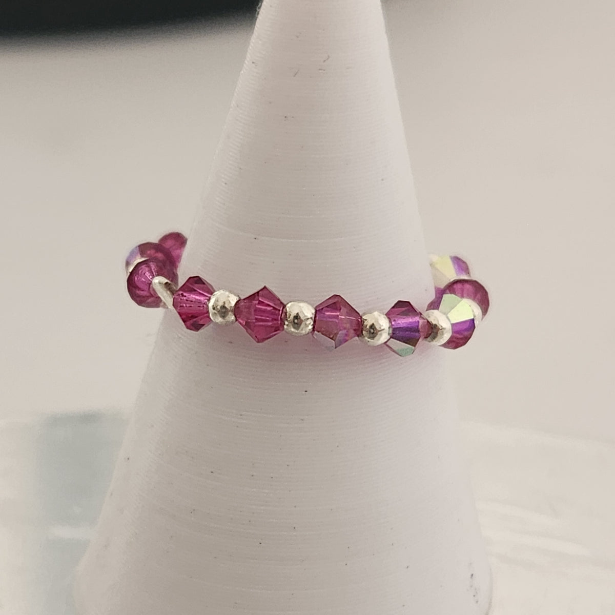 Anillo Sin Fin Biconos Piedras Swarovski 3mm y Plata 925