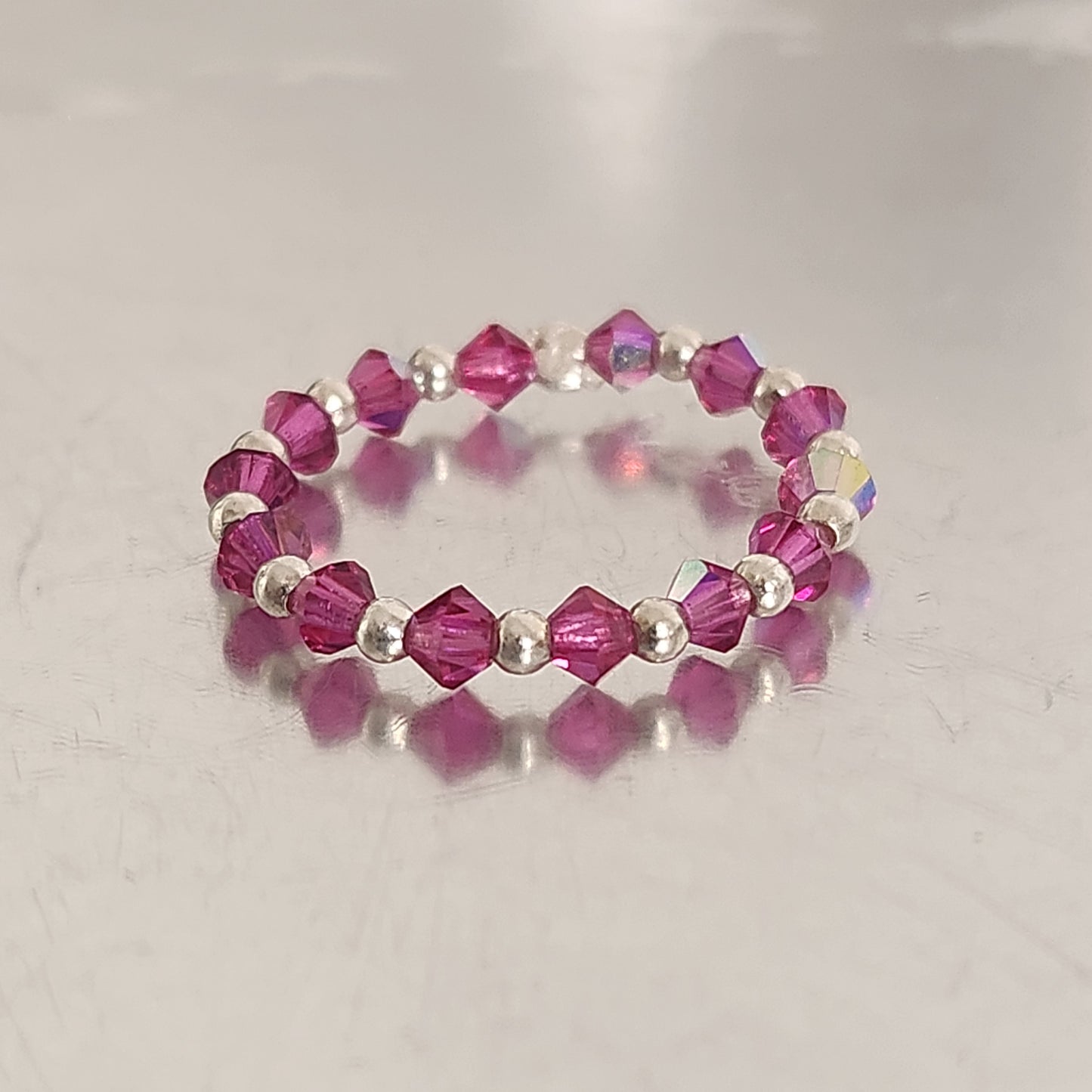Anillo Sin Fin Biconos Piedras Swarovski 3mm y Plata 925