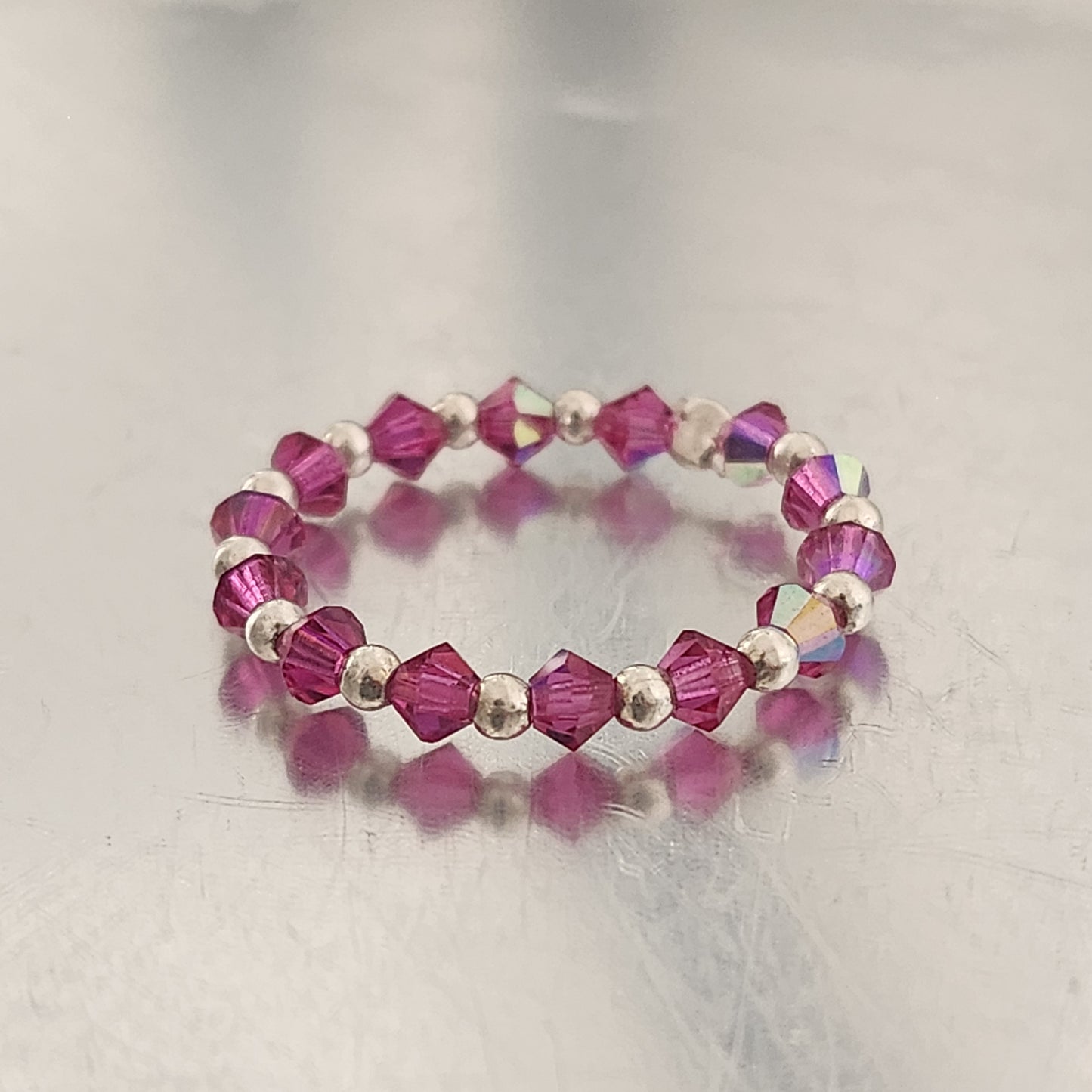 Anillo Sin Fin Biconos Piedras Swarovski 3mm y Plata 925