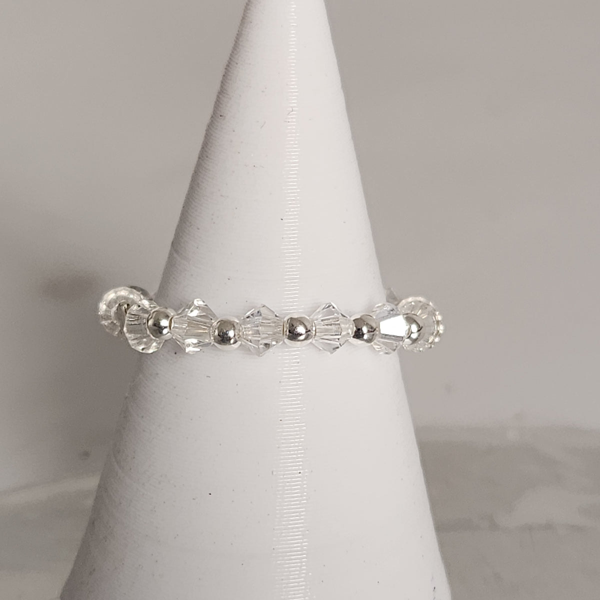 Anillo Sin Fin Biconos Piedras Swarovski 3mm y Plata 925
