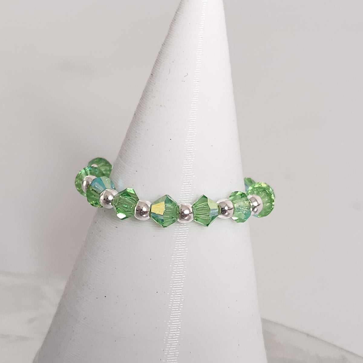 Anillo Sin Fin Biconos Piedras Swarovski 3mm y Plata 925