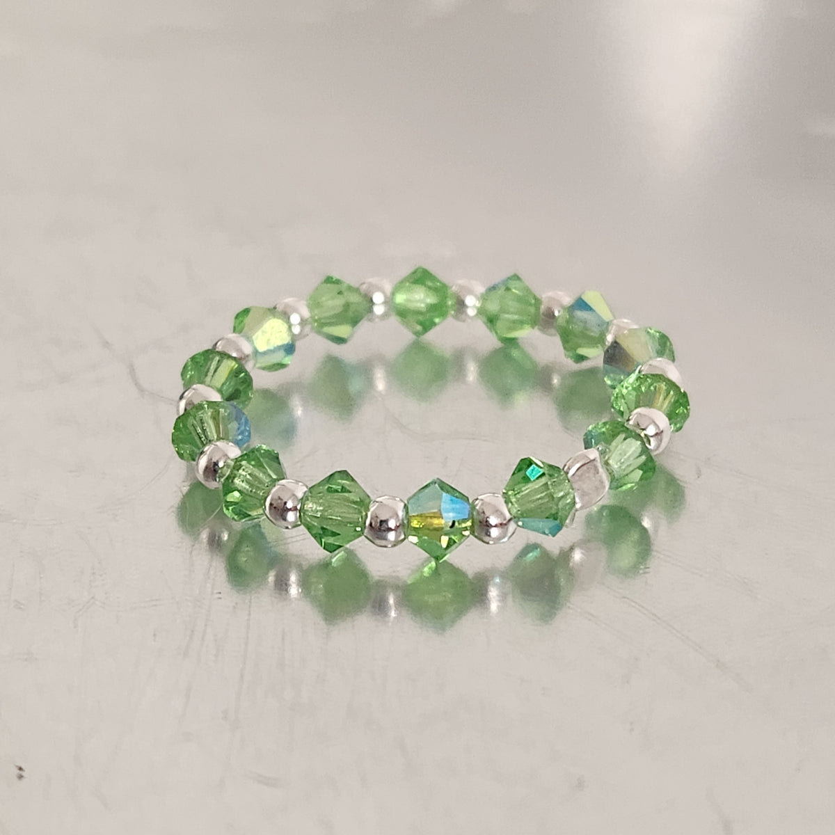 Anillo Sin Fin Biconos Piedras Swarovski 3mm y Plata 925