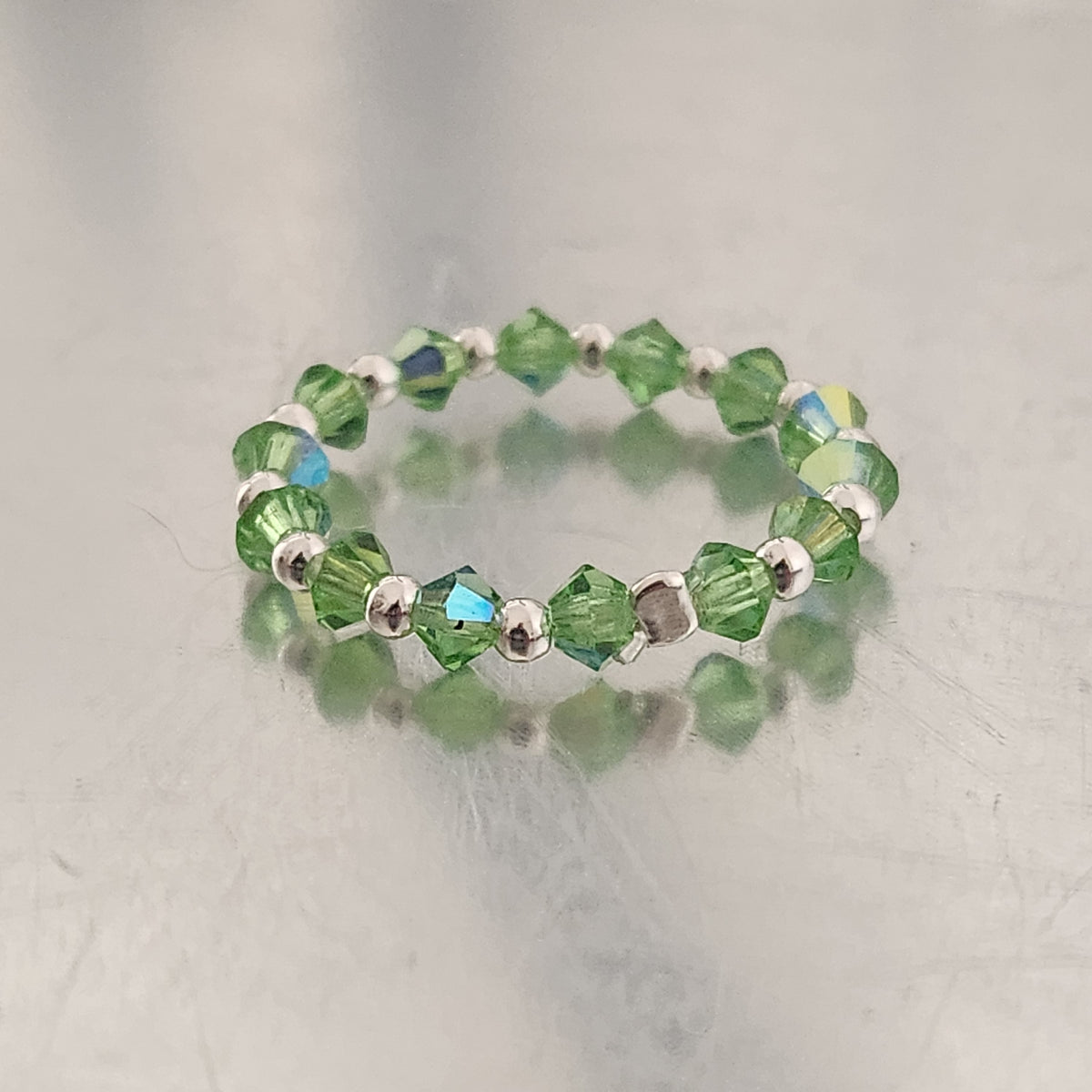Anillo Sin Fin Biconos Piedras Swarovski 3mm y Plata 925