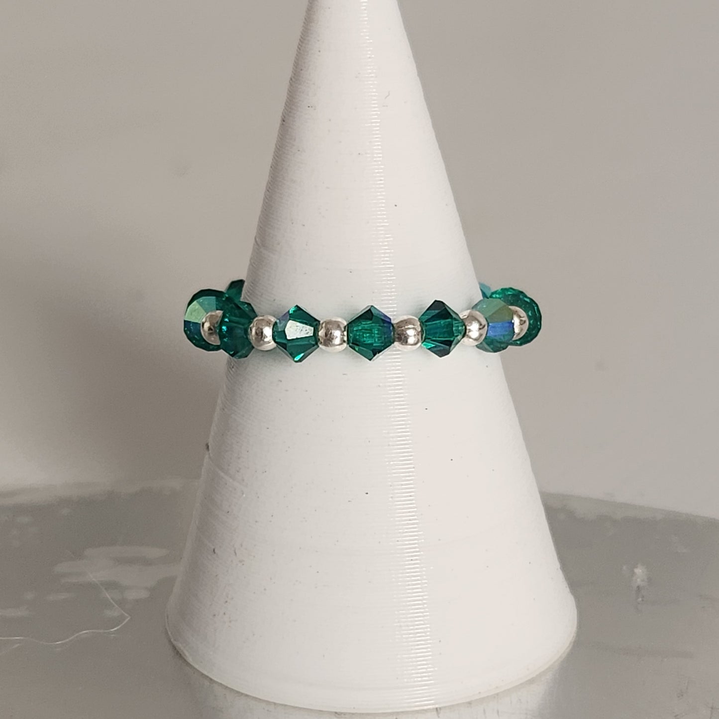 Anillo Sin Fin Biconos Piedras Swarovski 3mm y Plata 925