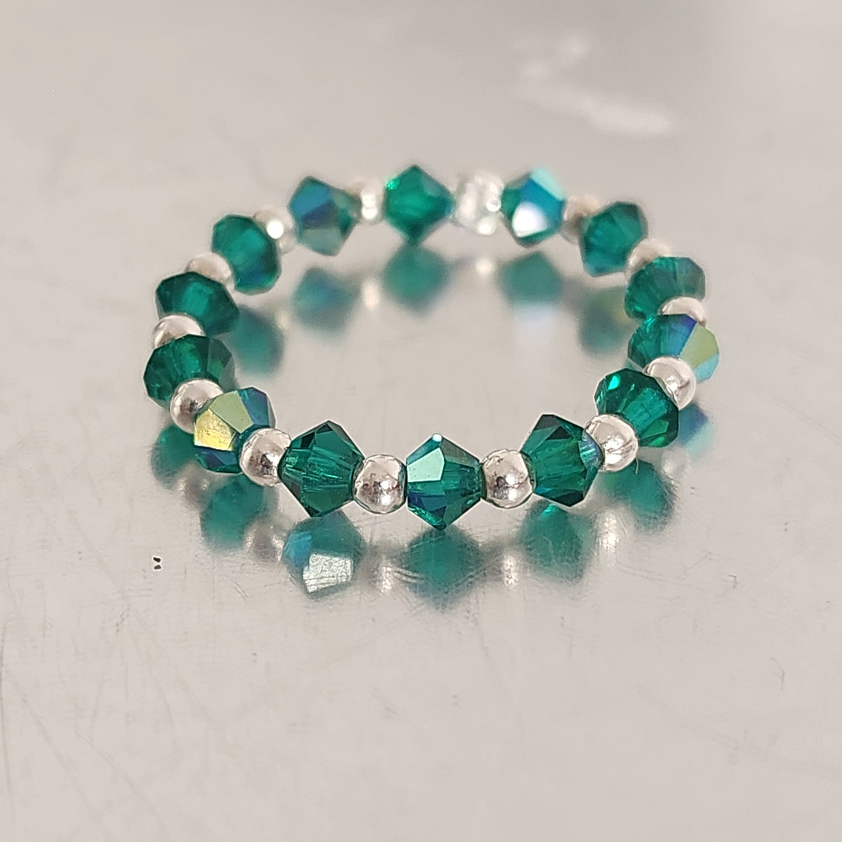 Anillo Sin Fin Biconos Piedras Swarovski 3mm y Plata 925