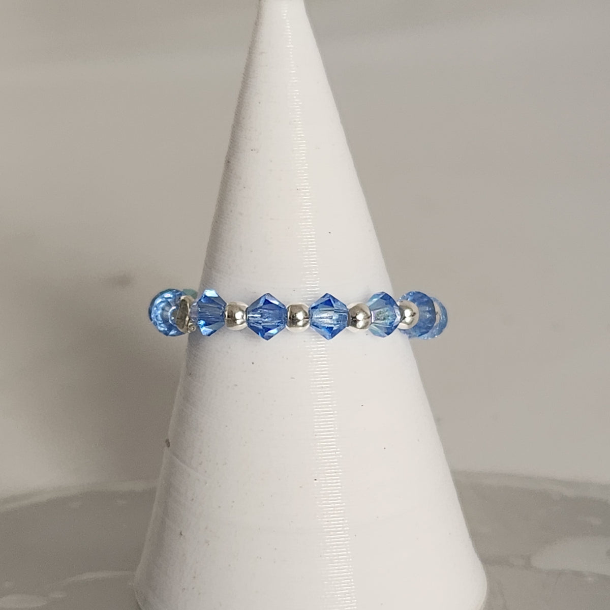 Anillo Sin Fin Biconos Piedras Swarovski 3mm y Plata 925