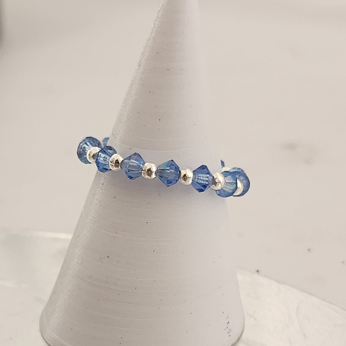 Anillo Sin Fin Biconos Piedras Swarovski 3mm y Plata 925