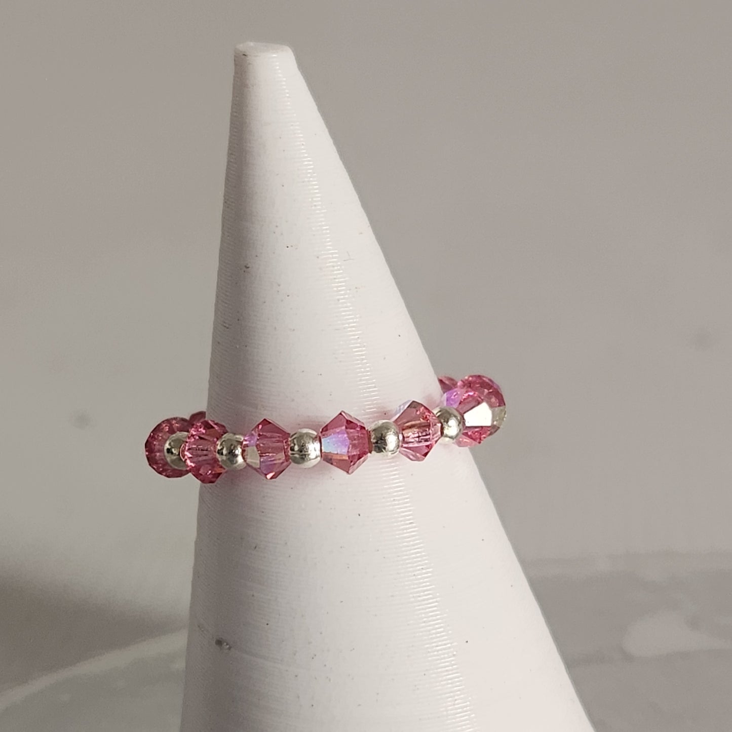 Anillo Sin Fin Biconos Piedras Swarovski 3mm y Plata 925