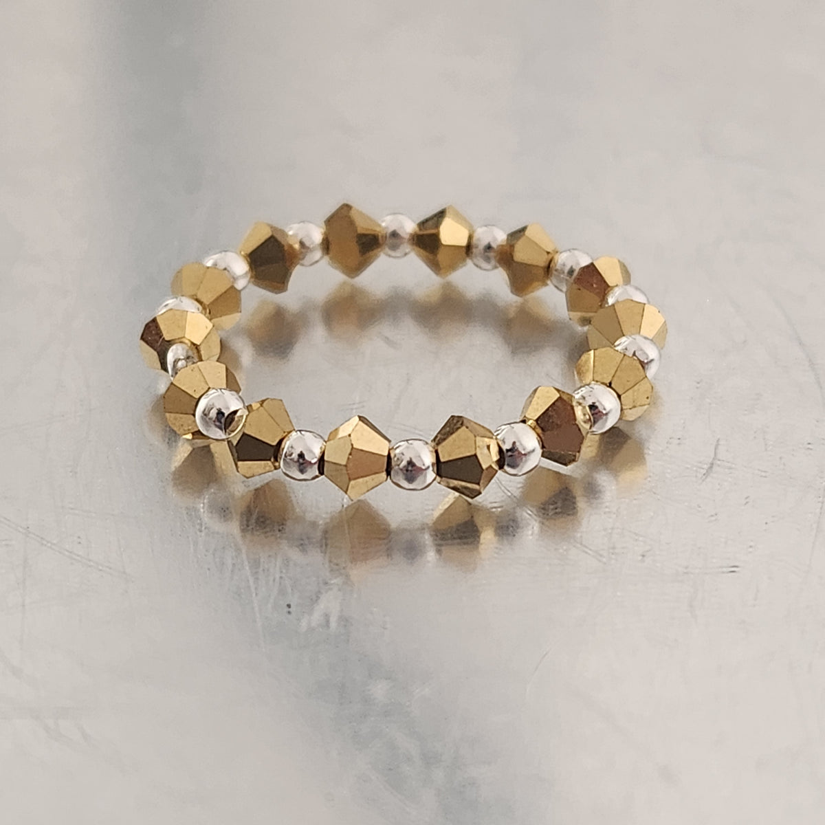 Anillo Sin Fin Biconos Piedras Swarovski 3mm y Plata 925