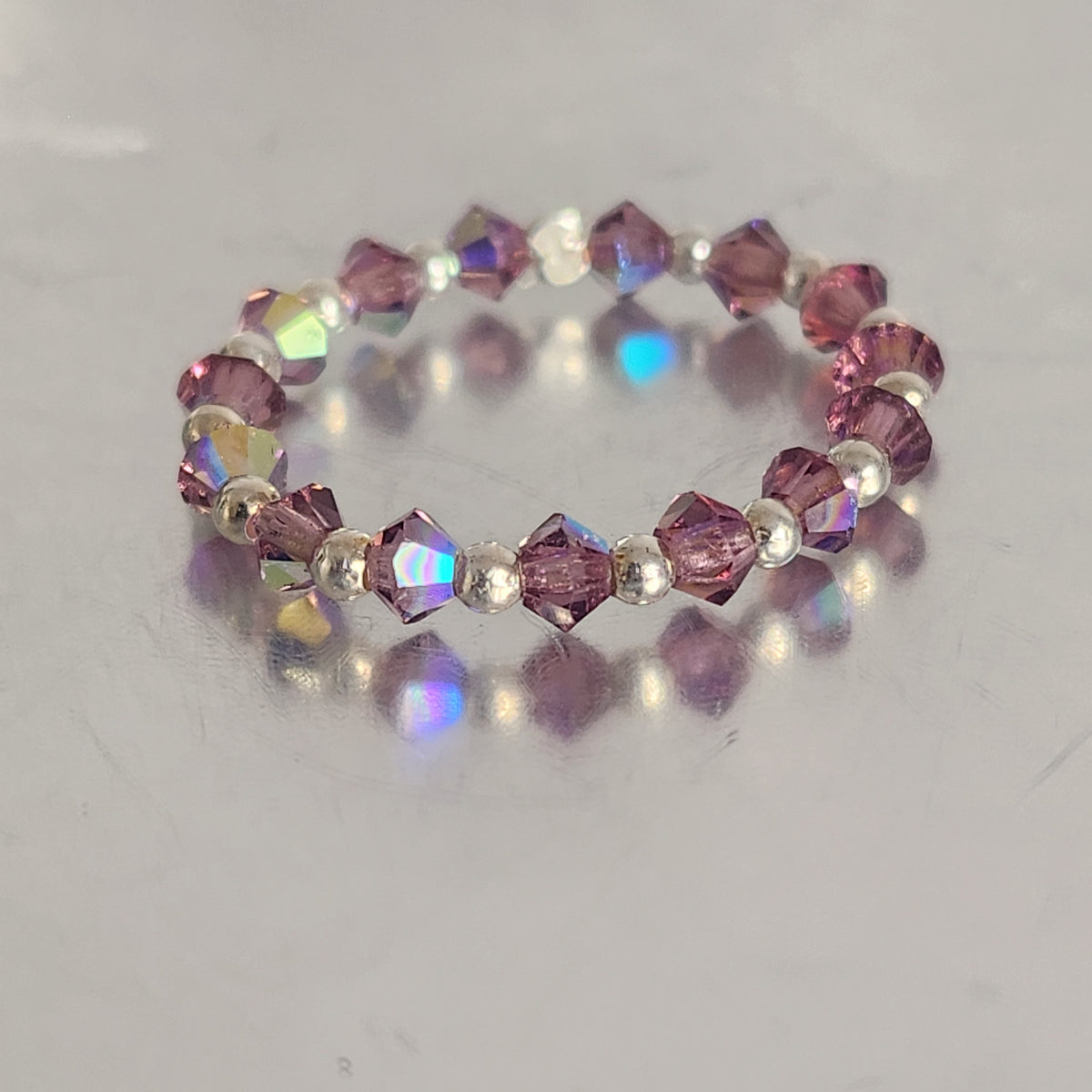 Anillo Sin Fin Biconos Piedras Swarovski 3mm y Plata 925