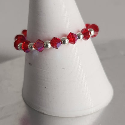 Anillo Sin Fin Biconos Piedras Swarovski 3mm y Plata 925