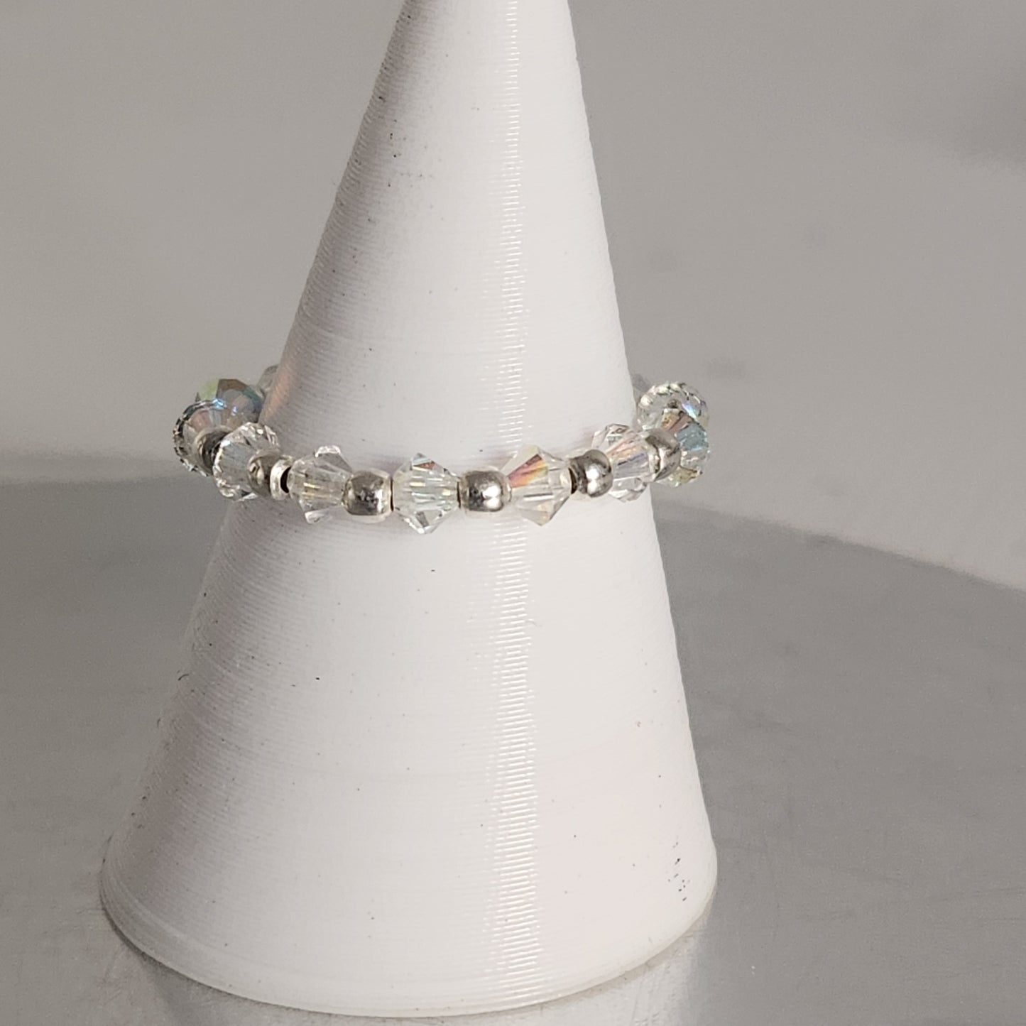Anillo Sin Fin Biconos Piedras Swarovski 3mm y Plata 925